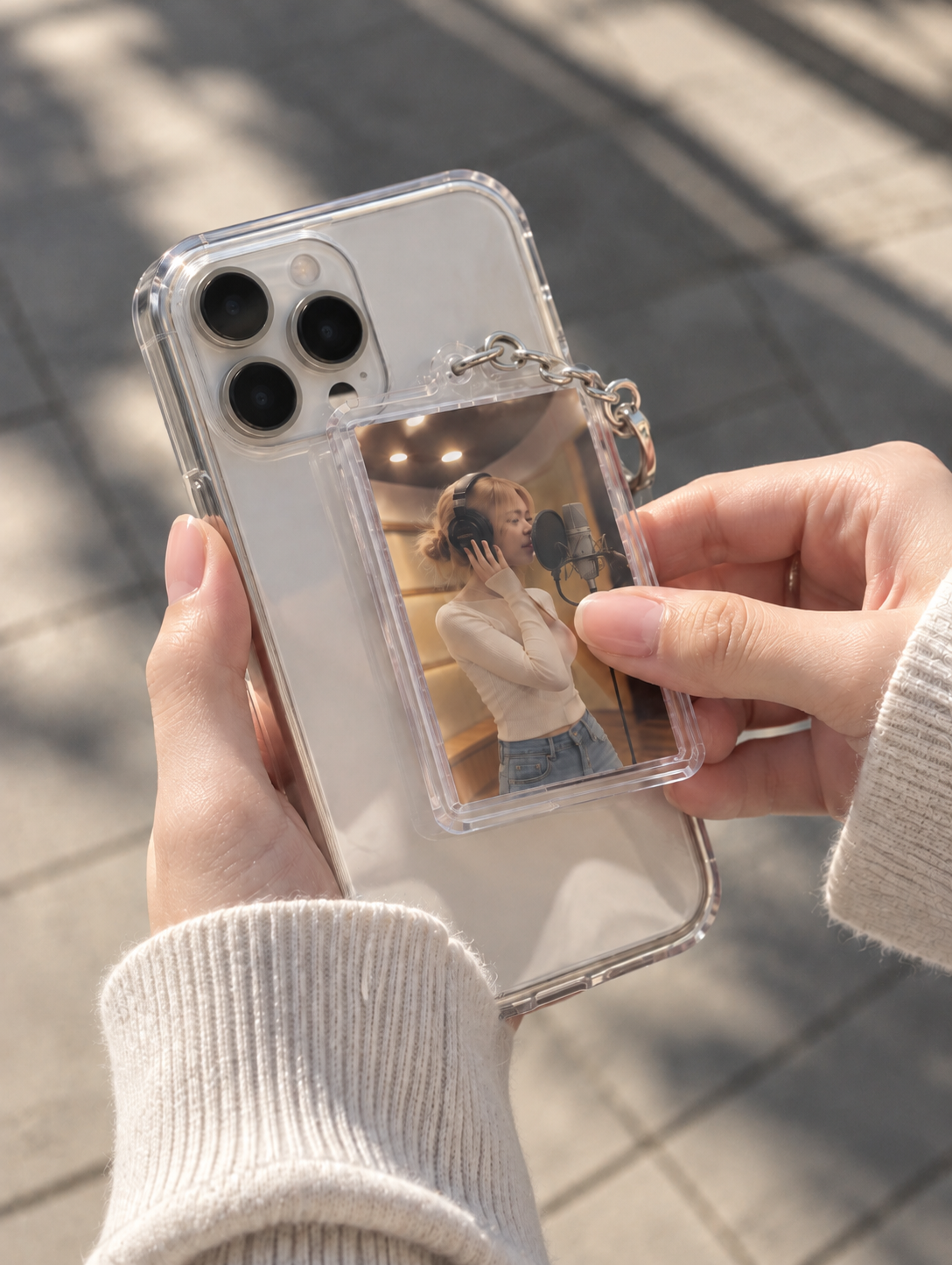 Personalized NFC music photocard held against the back of a smartphone